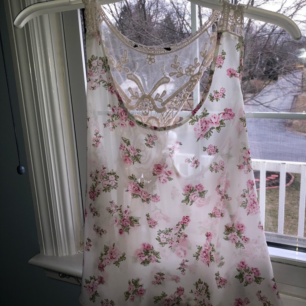 Sheer floral top with lace open back
